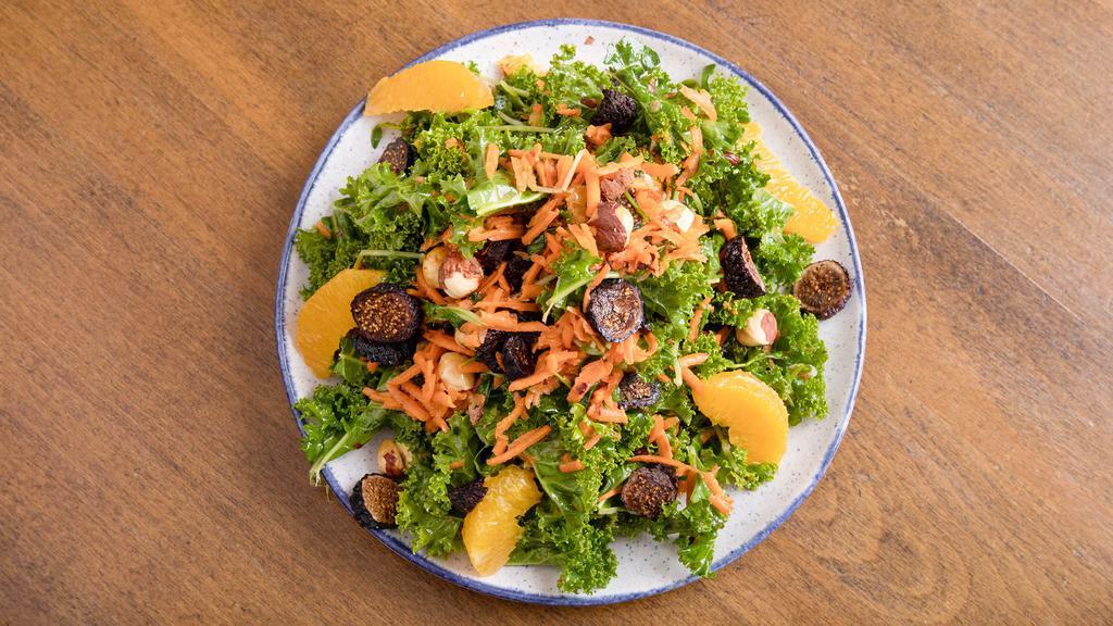 Citrus Hazelnut Kale Salad · Massaged kale, shredded carrots, sprouts, orange, toasted hazelnuts, dried figs, in an apple cider vinaigrette. All organic ingredients. Add avocado, tempeh or hummus for an additional charge.