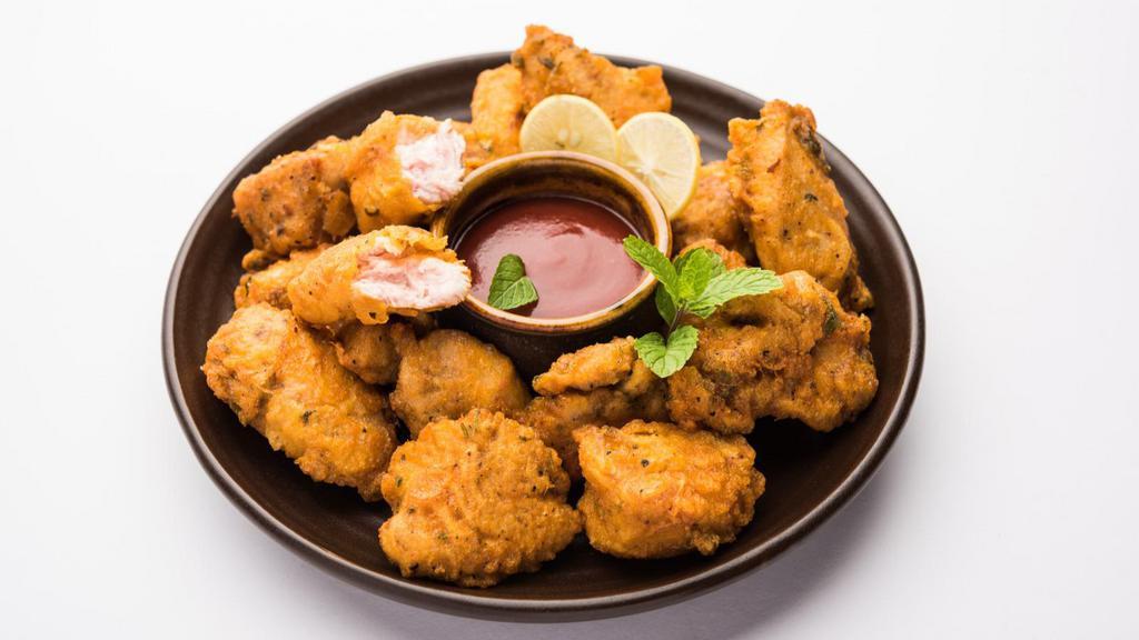 Chicken Pakora · Chicken freshly battered with chickpeas and Indian Spices. Comes with delicious tamarind sauce.