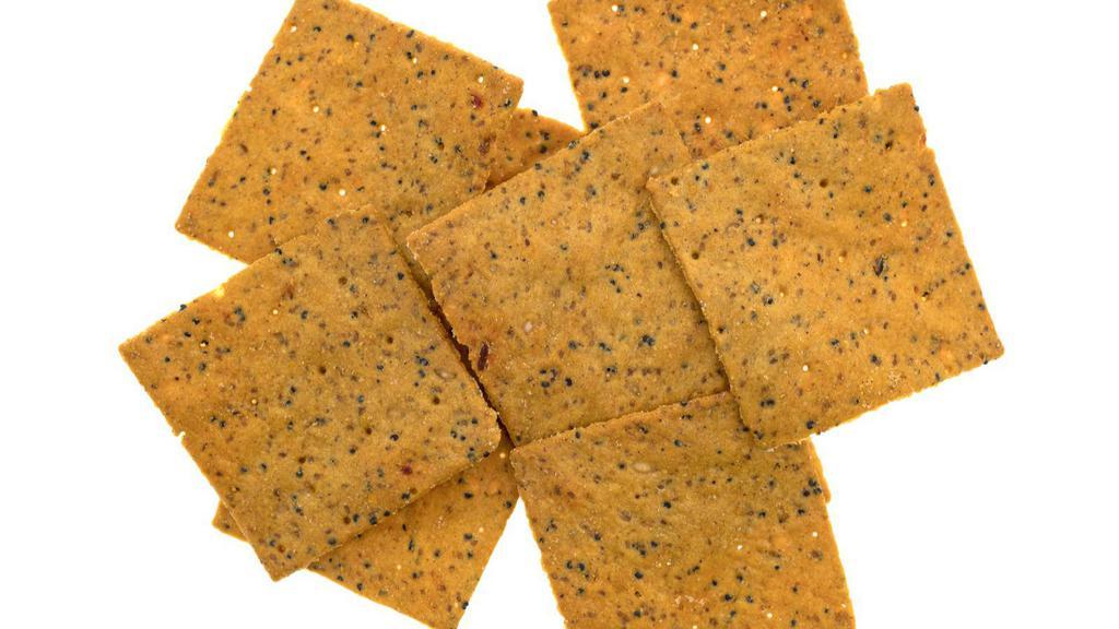 The Papadam · Crispy lentil crackers.