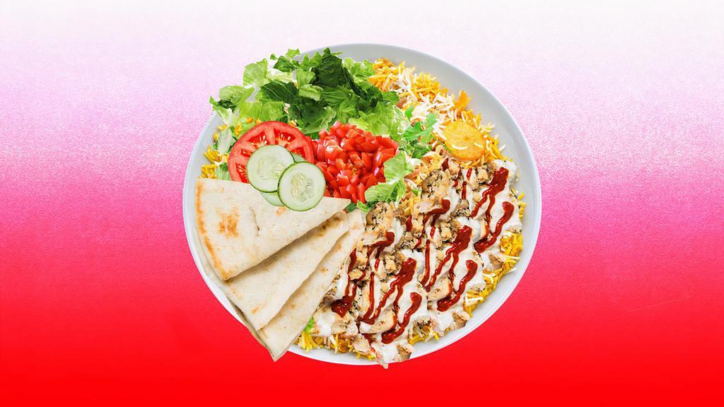 Spicy Chicken Shawarma Rice Platter · Tender chicken shawarma over rice and topped with spicy red sauce.  Served with cucumber & tomato salad, leafy greens, white sauce, and pita.
