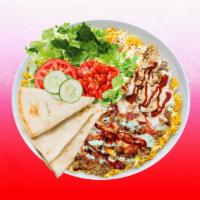 Spicy Combo Rice Platter · Chicken and beef shawarma over rice and topped with spicy red sauce.  Served with cucumber &...