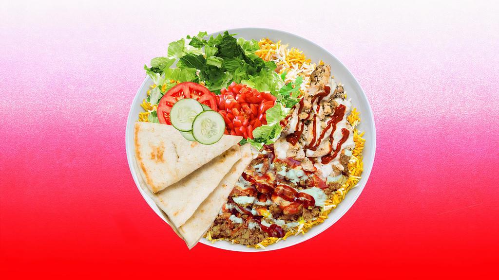 Spicy Combo Rice Platter · Chicken and beef shawarma over rice and topped with spicy red sauce.  Served with cucumber & tomato salad, leafy greens, white sauce, and pita.