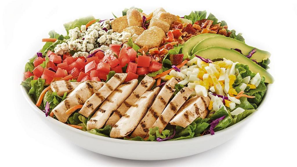 Cobb Salad · Grilled chicken breast, hardwood-smoked bacon, Bleu cheese crumbles, hard-boiled eggs, tomatoes, croutons and avocado on mixed greens. Served with choice of dressing.