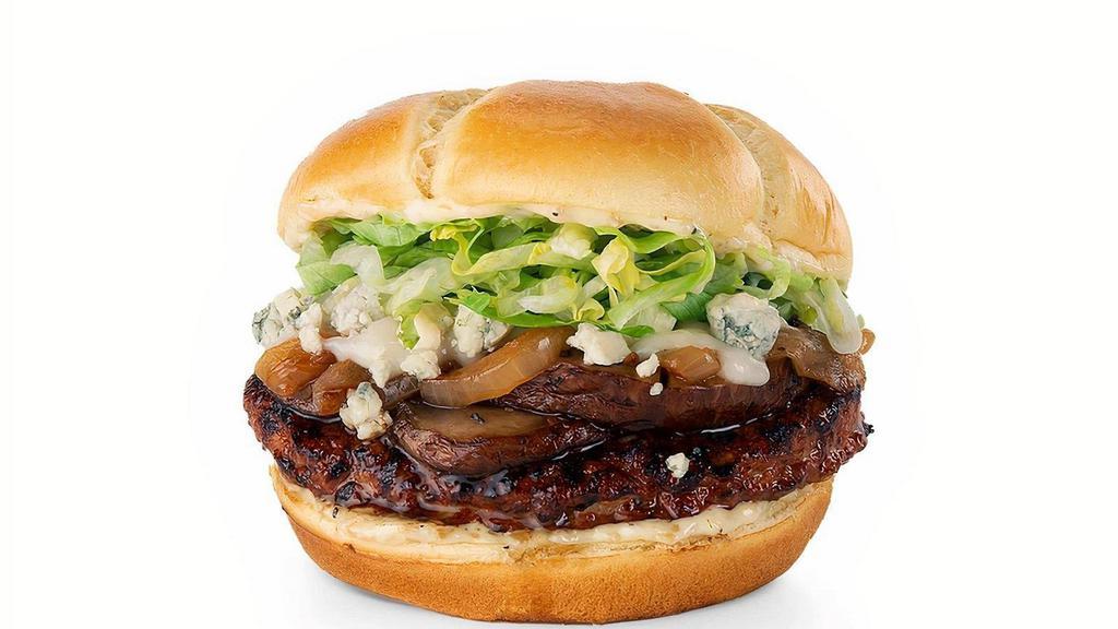 Porta-Blue Turkey Burger · Turkey burger with sautéed and blackened portobello mushrooms, caramelized onion, creamy cheese sauce, Bleu cheese crumbles, lettuce and roasted garlic aioli on a toasted brioche bun.