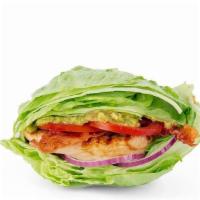 The Keto Green Queen · Grilled chicken, hardwood-smoked bacon, house-made guac, tomatoes and red onions in a lettuc...