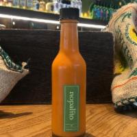 Piquin Hot Sauce · Our housemade hot sauce made with piquin chiles