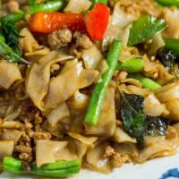 Pad Kee Mao · Stir fried flat rice noodle and your choice of ground chicken, beef, or pork with green bean...