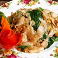 Pad See Ew · Stir fried flat rice noodle and tofu and vegetables with egg, Chinese broccoli in sweet blac...