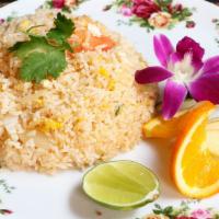Thai Style Fried Rice · Fried rice with your choice of sliced chicken, beef or pork, egg, white onion, green onion a...