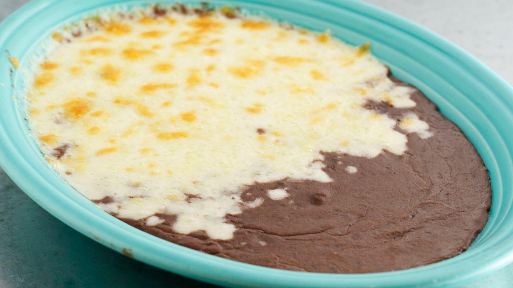 Bean & Cheese Dip · Our unique blend of refried black beans and cheese