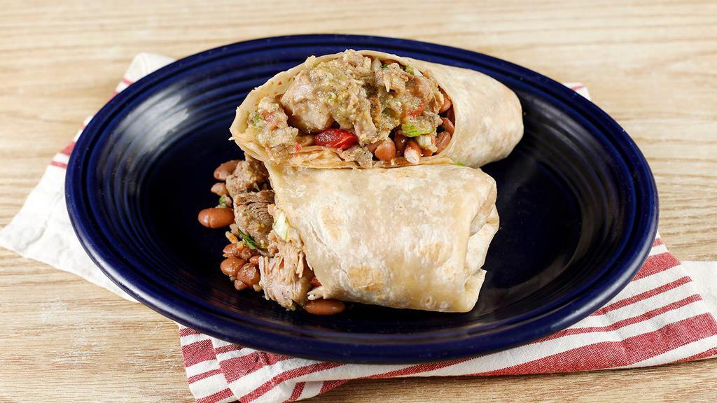 Chile Verde Burrito · Tender chunks of pork cooked in a tangy, green tomatillo and serrano pepper sauce; served with choice of beans, rice, pico de gallo and tortilla or try it naked with lettuce. Comes with a single serving of papalote salsa and a few chips.
