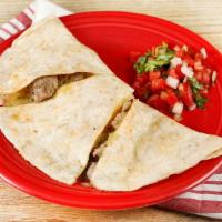 Chile Verde Quesadilla · Pork in green serrano sauce; served on a flour tortilla with melted cheese. Comes with a sin...