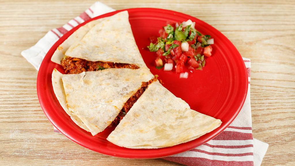 Soyrizo Quesadilla · Vegetarian. Vegan soyrizo; served on a flour tortilla with melted cheese. Comes with a single serving of papalote salsa and a few chips.
