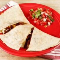 Mole Tofu Quesadilla · Vegan mole tofu served on a flour tortilla with melted cheese. Comes with a single serving o...