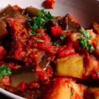 Eggplant Curry · Asian eggplant cooked with potato, ginger garlic paste, onion, and roasted spices with potat...