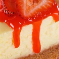 Strawberry Cheesecake · Classic cheesecake with a rich, dense, smooth, and creamy consistency topped with delicious ...