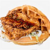 Fried Chicken & Waffle Sandwich · Crispy fried chicken with coleslaw, pickles, and mayo sandwiched between two Belgian waffles.
