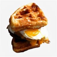 Waffle & Egg Sandwich · A fried egg with cheddar cheese and mayo sandwiched between two Belgian waffles.