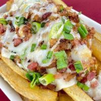 Loaded Fries · French fries loaded with cheese, bacon, and green onion.