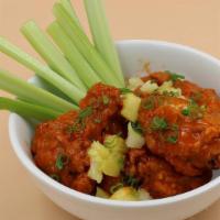 Spicy Unicorn Wings $15 · 8 Crispy Wings Tossed in Buffalo Sauce, Served with Celery and Ranch
