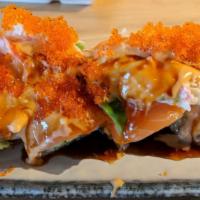 Titanic Roll · Shrimp tempura, cucumber, inside tuna, salmon, crab, green onion with tobiko.