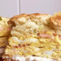 Lox Special · Eggs scrambled with lox and red onion on a Dill Swiss biscuit with lemon aïoli and cream che...