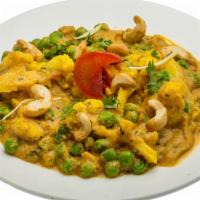 Aloo Ghobi Curry · Cauliflower cooked with potatoes.