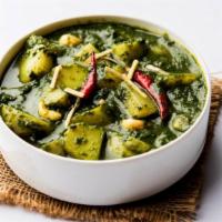 Aloo Palak · Delicious spinach and potatoes cooked with ginger and garlic.
