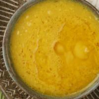 Daal · Yellow lentils cooked in a special blend of spices.