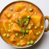 Aloo Mutter · Potatoes cooked with green peas and spices.