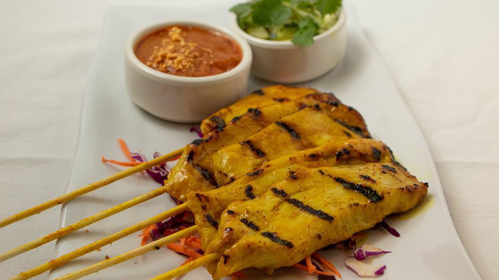 Satay Chicken  · Sala Thai's Favorite. Grilled marinated  chicken on skewers with Thai herbs, spices, and coconut milk. Served with cucumber salad and peanut sauce.
