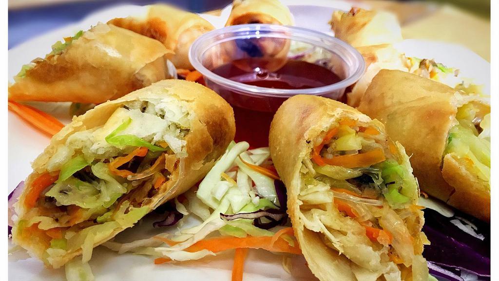 Deep-Fried Spring Roll · Sala Thai's Favorite. Vegetarian. Deep-fried vegetarian spring rolls stuffed with silver noodles, cabbage, carrot, and shiitake mushroom. Served with plum sauce.