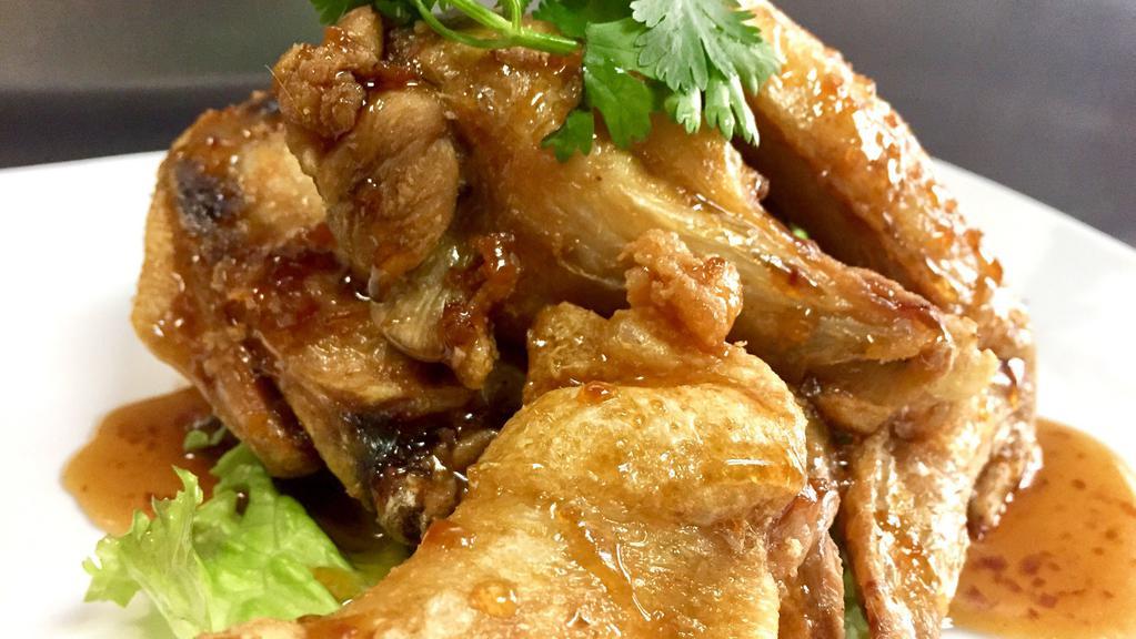 Fried Chicken Wings with Garlic Sauce (Peak Kai Tod) · Deep fried chicken wings with our famous sweet garlic sauce