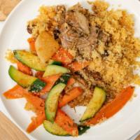 Lamb with Couscous · Lightly seasoned with mild spices served with couscous and mixed vegetables.