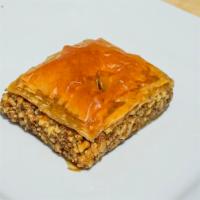 Baklava · A pair of pastries mode of layers of phyla dough filled with chopped nuts and sweetened with...