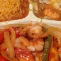 Camarones Rancheros · Large prawn, bell pepper, onions and tomato on mild sauce, served on a bed of lettuce with b...