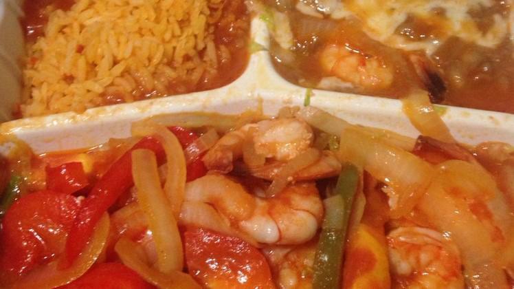 Camarones Rancheros · Large prawn, bell pepper, onions and tomato on mild sauce, served on a bed of lettuce with beans, rice, and tortillas.