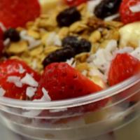 Bionico · Fresh mixed fruit in a sweet cream topped with granola, coconut and raisins.