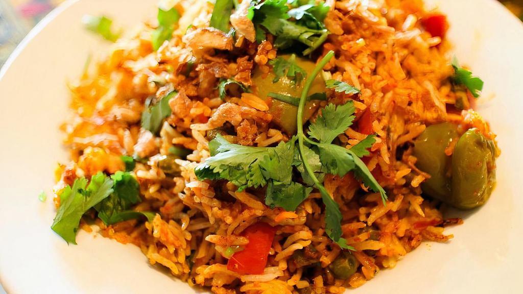Vegetable Biryani · Fine basmati rice fried and cooked with vegetables, saffron & fragrant spices