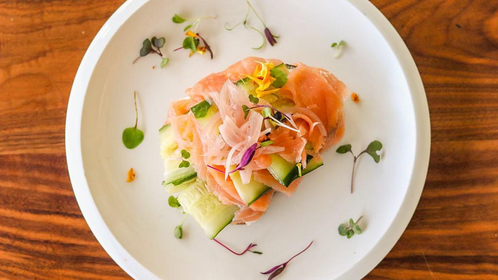 Smoked Salmon · Smoked salmon, cucumber, pickled shallots, fried capers, hard-boiled egg and honey mustard spread.