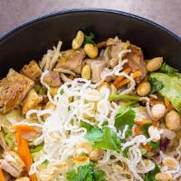 Asian Chicken Salad · Grilled chicken, mixed greens, peanuts, rice noodles, cilantro, sweet and spicy dressing.