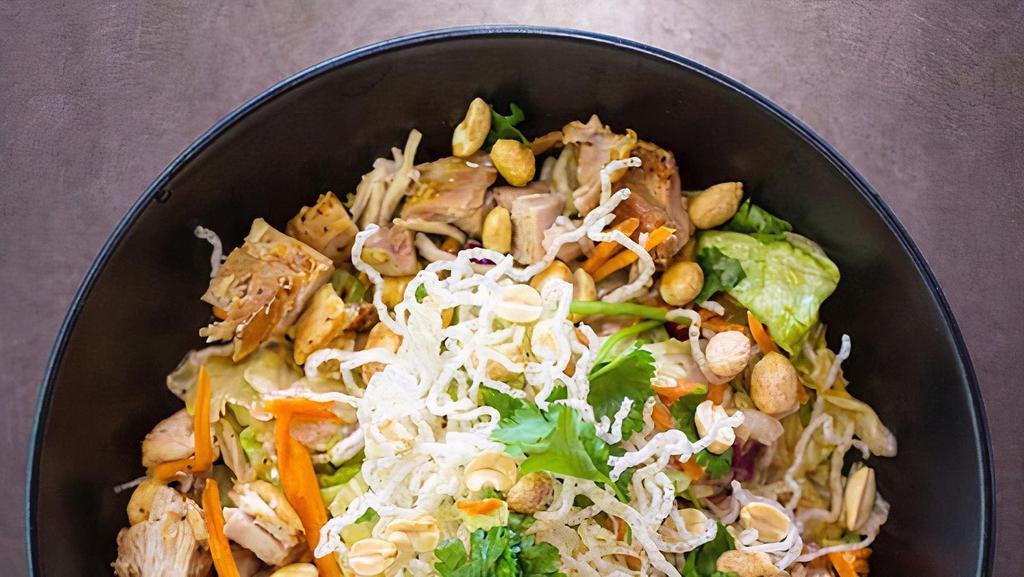Asian Chicken Salad · Grilled chicken, mixed greens, peanuts, rice noodles, cilantro, sweet and spicy dressing.