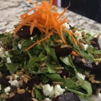 Beet Salad · Vegetarian. Homemade pickled beets, spring mix, goat cheese, carrots, pumpkin seeds, and hom...
