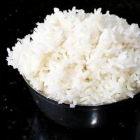 Tamarind Rice · Rice flovored with tamarind and spices.