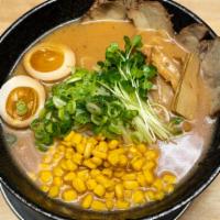 Miso Ramen · Soybean paste broth with chashu pork, egg, bean sprouts, bamboo, kaiware sprouts, and green ...