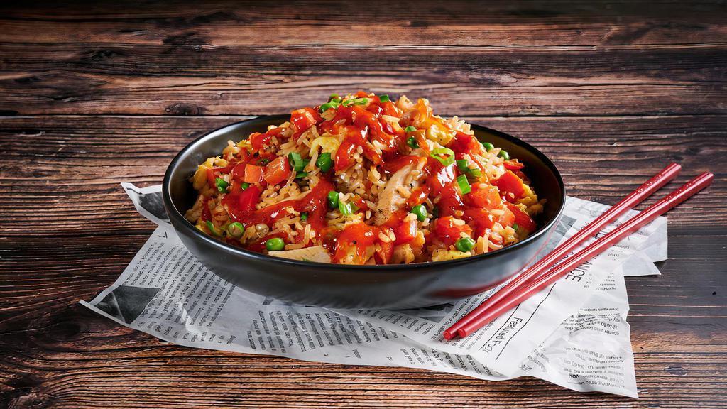 Spicy Fried Rice · Our Classic Fried Rice kicked up a notch with a secret spicy sauce, featuring rice, eggs, a vegetable medley, choice of protein and a large drizzle of Hot and Spicy sauce