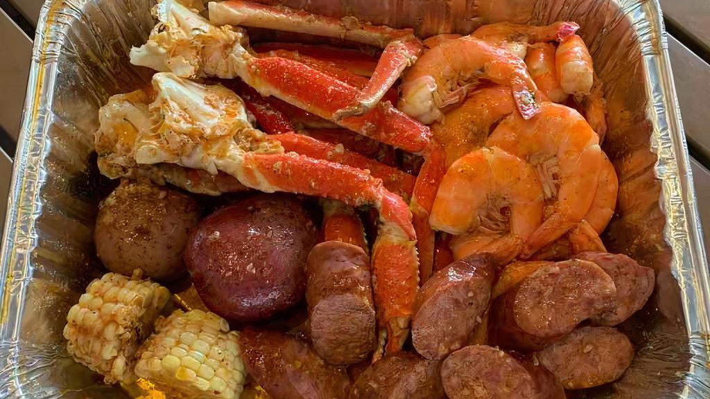 Tasting Menu E / 嘗鮮套餐 E · Set for 2. 
Headless Shrimps 1 lb, Snow Crab Legs 1 lb, Sausage 0.5 lb, Corn 2 pcs, Potato 2 pcs