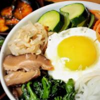 Bibimbap · Most popular item. Variety of seasoned vegetables with fried egg and a choice of topping. Se...