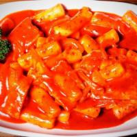 Ddukbokki · Rice cake & fish cake cooked in House Spicy Sauce.