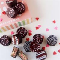 Valentine Cookie Dough Cruffles · Includes 12 assorted cookie dough cruffles with Valentine's Day toppers + decor